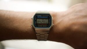 a close up of a person's wrist with a watch on it
